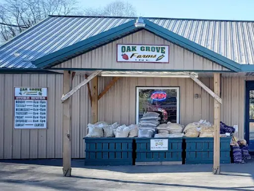 A welcoming farm store shows goods for sale outside and displays a Mid State Baths notice near the door.