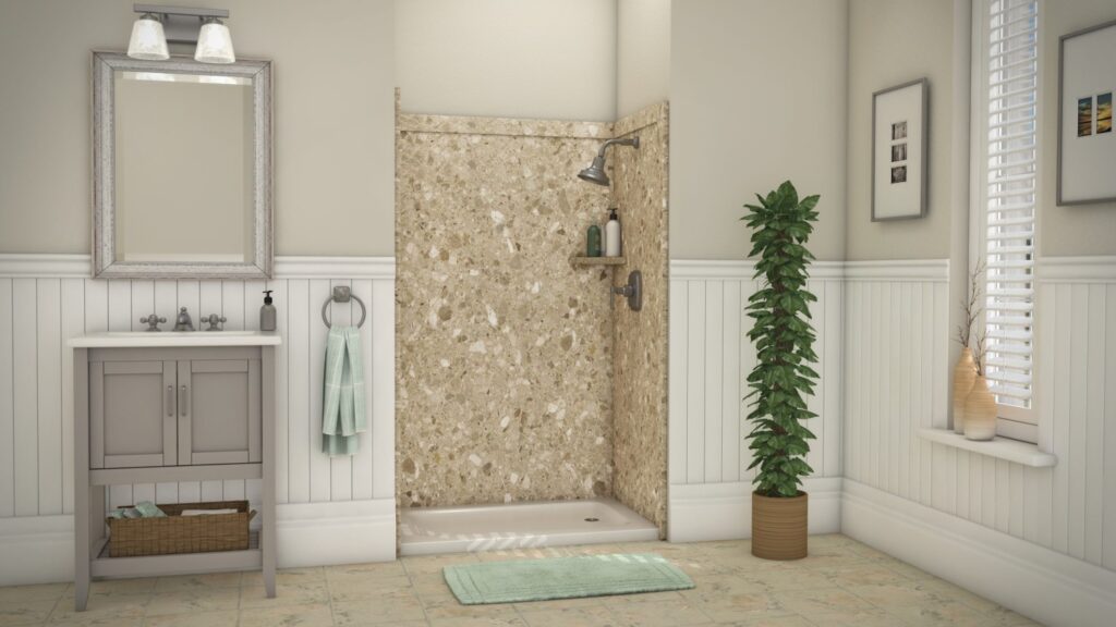 A clean, modern bathroom remodeled by Mid State Baths, showing a cozy space with light colors and simple, stylish details.